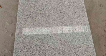 郴州芝麻白光面毛板